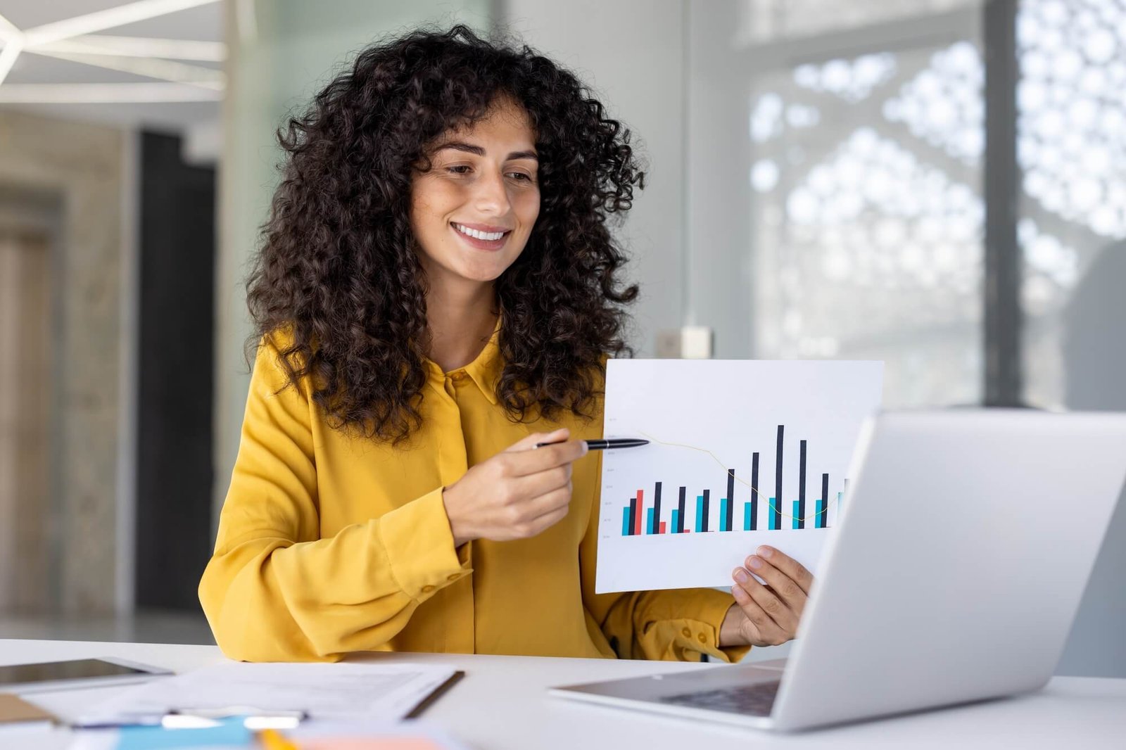 Happy client reviewing financial plan