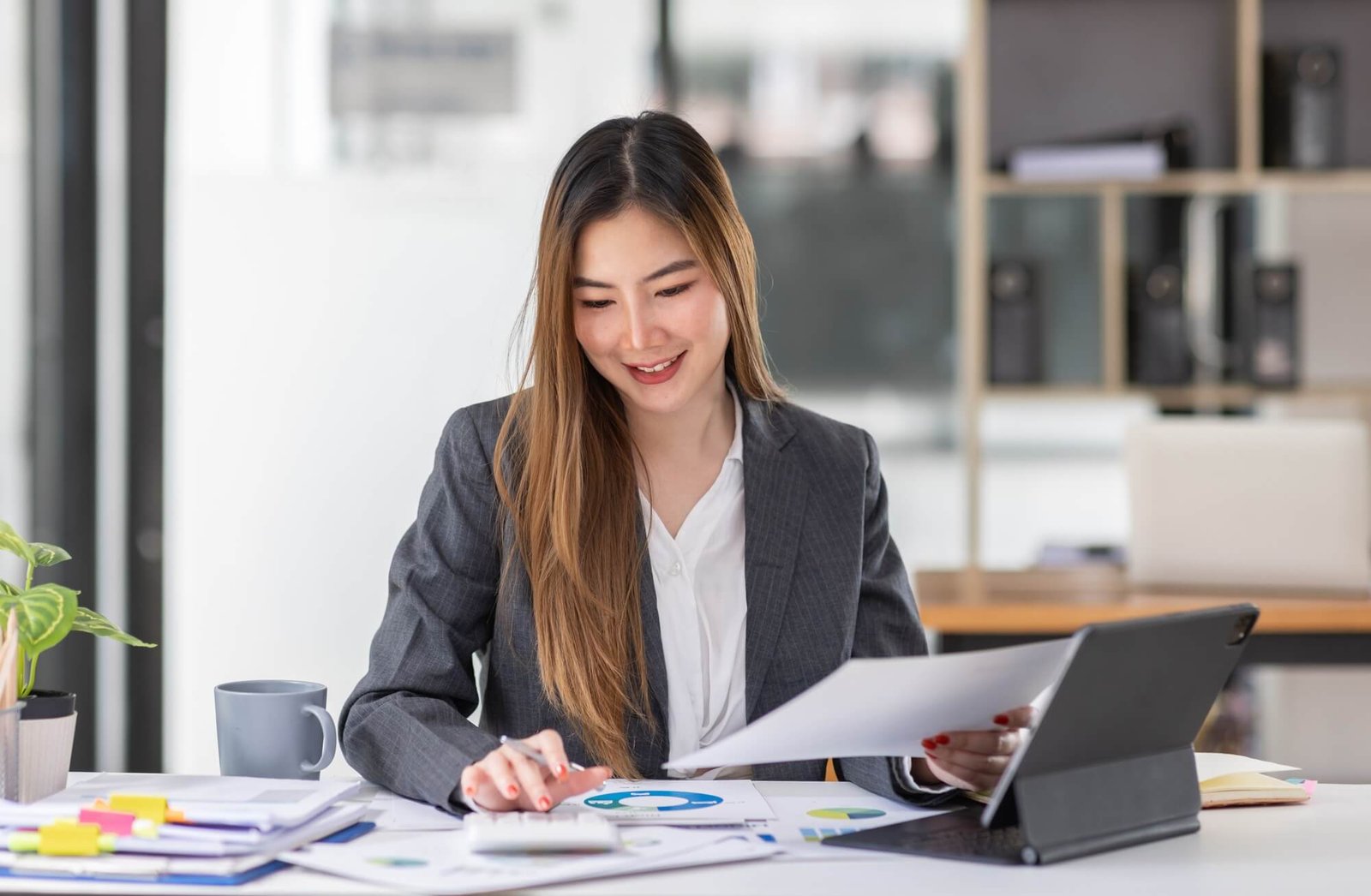 Financial advisor reviewing investment documents